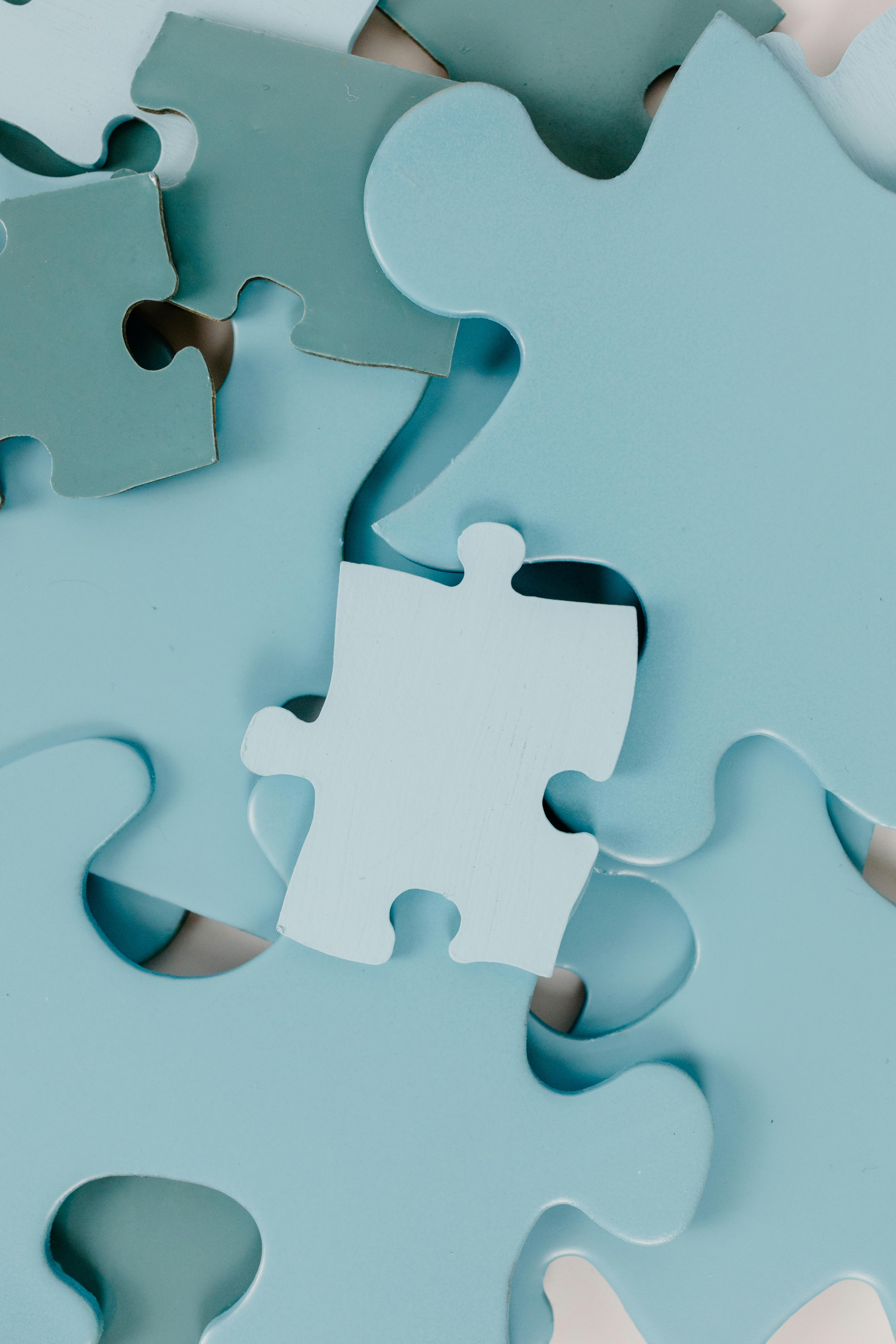 High-quality close-up image of blue puzzle pieces, ideal for creativity and problem-solving themes.