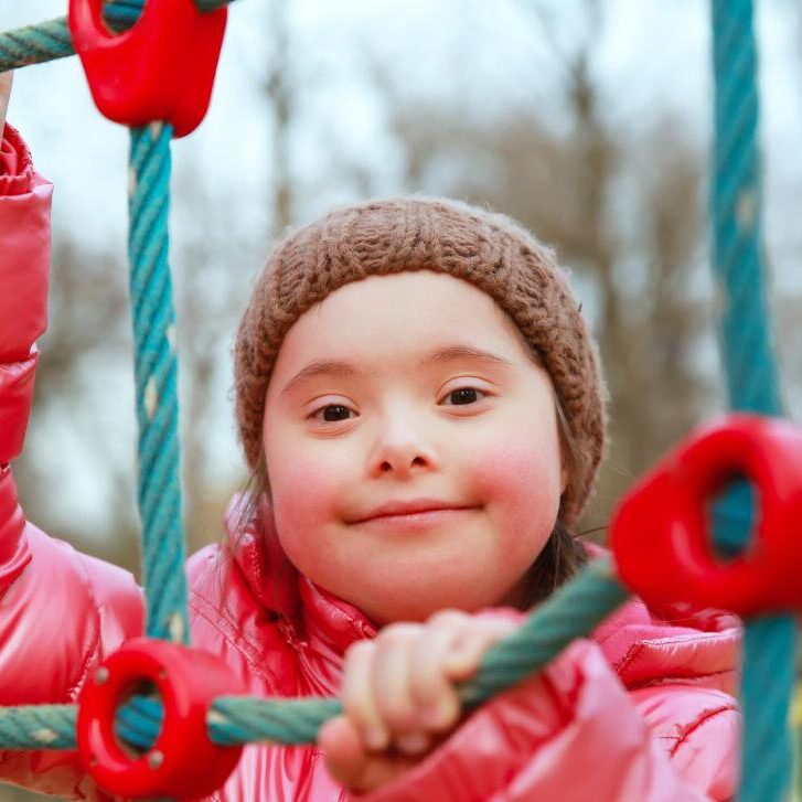 Portrait of beautiful girl on the playground